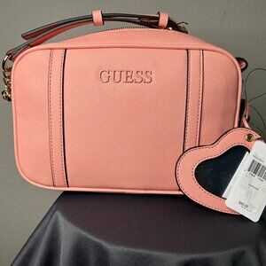 Guess peachy/pink color crossbody/shoulder bag.